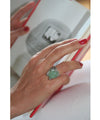 Art deco jade ring adorned with silver and designer marcasites