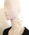 Oversize golden earrings - "Les Dunes" eloïse fiorentino worn
