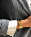 bracelet-jonc-large-doré-gearing-isabelle-michel-porté.jpg