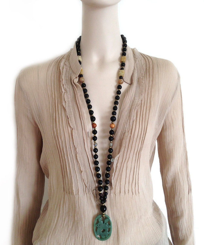 Long necklace with wooden beads and jade medallion - Jewels of Mala
